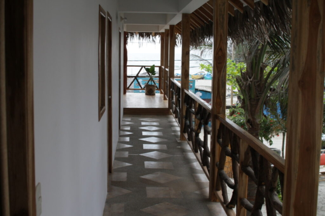 The passageway in front of dorm rooms leading to big balcony